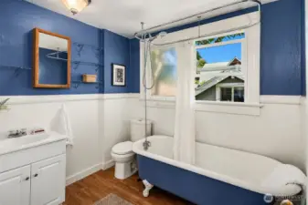 Upstairs bath with claw foot tub.