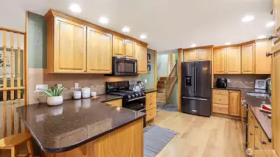 Featuring sleek stainless steel appliances that bring modern convenience to the heart of the home.