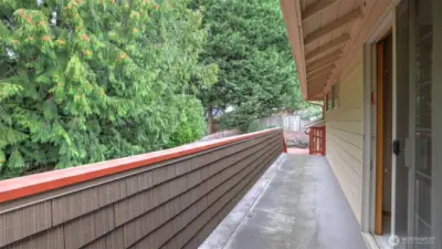 Direct access to the backyard deck makes this primary suite a true extension of outdoor living.