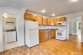 Large kitchen with laundry room