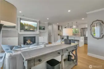 Entry opens to a bright living area