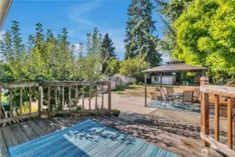 Deck off the dining area overlooks the backyard.