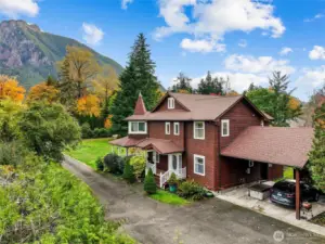 Carport behind home.  Front of home looks at Mt. Si like it's in your backyard.  Actually it's your front yard view!