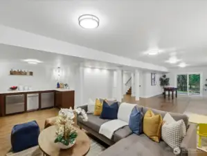 Light and bright, and complete with wet bar with sink, dishwasher, and 2 refridgerators!