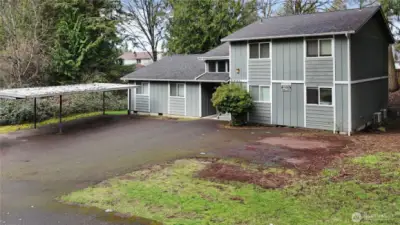 Carport comfortably fits 3 cars
