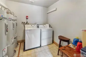 Coin operated laundry shared by units