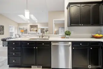 Open Concept Kitchen with newer farm sink and fixtures