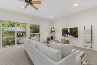 Lovely large windows to let in the back garden spaces. Back slider gives you access to your detached 1-car garage with EV charger and gated alley access to 2 additional parking spots.