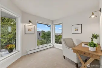 This sitting area is large enough for a desk. Perfect for daily journaling or planning out your day's adventures.