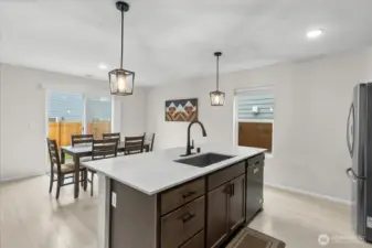 Kitchen view looking into dining area.