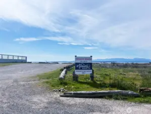 To the beach, the pool is on the left as you walk by towards the beach.