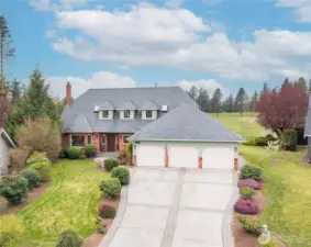 Extra-large driveway, 3 car garage, 1 year old roof, this estate makes a lasting impression!
