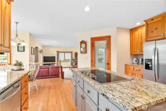 Contrasting island with extra storage & cooktop, large walk-in pantry & nice coffee nook to left of fridge