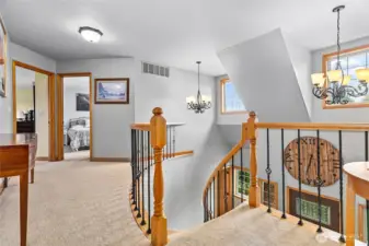 Heading back inside, nice open 2nd floor hall landing. Owner's suite through door on left, 1 of 3 more bdrms to right