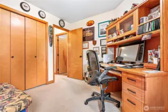 On main floor, next to stairway you'll find nice size office w/closet. Has dual access to foyer area & back to family room