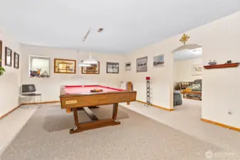 To complete the tour of this nearly 4,000 sq ft home, heading down to the basement this huge room has been finished as a game/rec room (pool table could stay!)