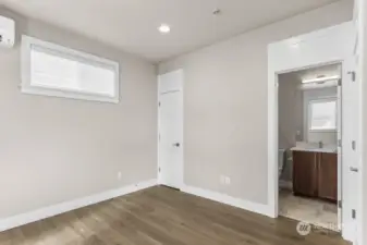 Lower level bedroom / office showing the attached 3/4 bathroom.