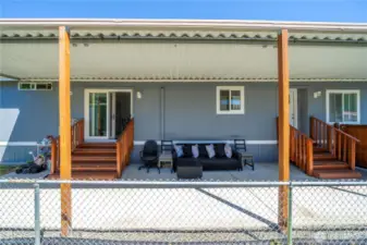 Large patio with living room and dining room access.