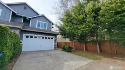 Unit B with 2 car garage and driveway parking