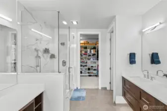 Spa-quality bath with heated floors, Quartz counters & dual sinks.  There is under-cabinet lighting that works as a great night light.