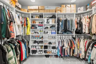The huge primary closet with organizers can handle an extensive wardrobe.
