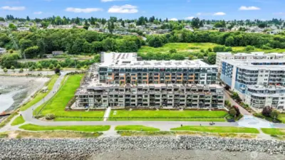 The Rainier building is the last building at this end of the Point Ruston community. The carefree lifestyle means SELLING the mower and never cleaning gutters again!