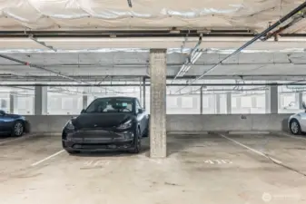 2 Garage Parking spaces included-  The pole between means it becomes a no-knicker!
