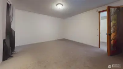 Primary suite with walk in closet and closet system