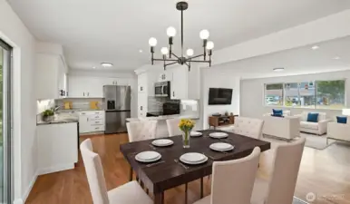 Flow easily from the kitchen to the dining room to the living room. Virtually staged.