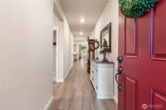 High ceilings, wide hallways and tons of light welcomes you into this lovely home.