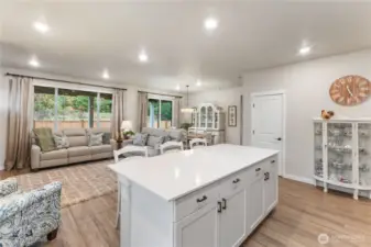The living/dining room directly off the kitchen is perfect for entertaining.