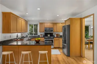 Spacious kitchen with granite countertops