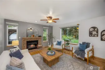 Living room with cozy wood burning fireplace