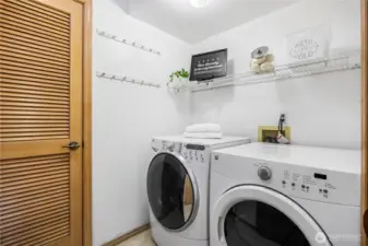 Laundry room just beyond half bath