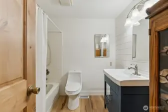 Full 2nd bath with updated vanity, raised toilet.