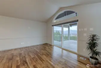 Living space with hard woods flows to the viewing deck