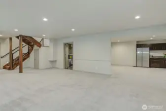 Down the stairs You'll LOVE the huge rec room