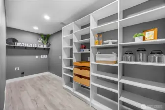 Walk-in pantry and main floor laundry.