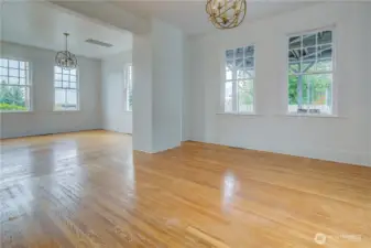 Hardwoods in the dining and living room with walls of windows inviting the natural light in.