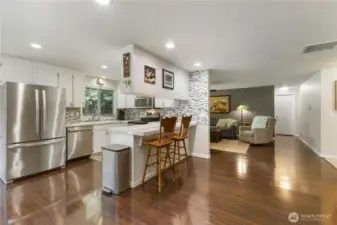 Kitchen boasts Moen water filter at sink, and to refrigerator, dining room, eating bar, and SS appliances!