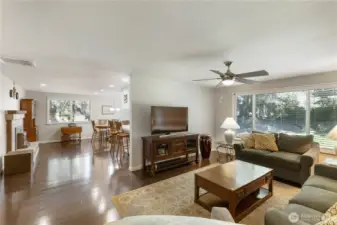 Living room opens to kitchen and dining area.