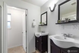 ...an ensuite bath with dual sinks, separate water closet...