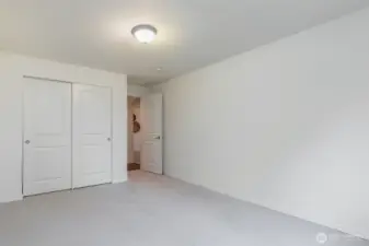 Bedroom #1 on the main level - with fresh new carpet & interior paint.