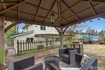 Upper backyard sitting area plus more yard space for games or pets or both!