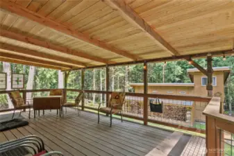 This covered back deck is  gorgeous!