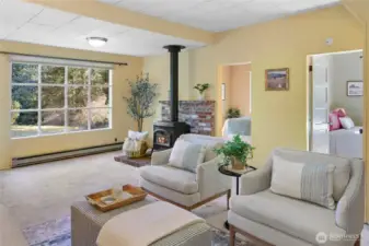 A propane fireplace and baseboard heat give the first floor a warm, cozy ambiance.