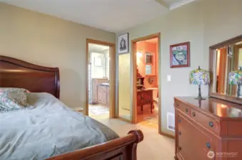 The primary bedroom suite is unique. You have double doors out to the wrap around view decks and a powder bath with walk in closet.