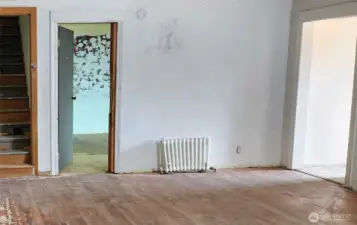 Living room, with front door off to the right