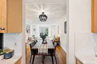Stunning feature ceiling in dining room adds dimension