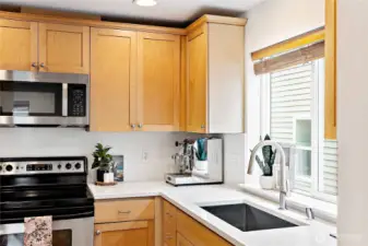 1 year new microwave, plus all new quartz countertops, backsplash,  undermount sink, and new faucet